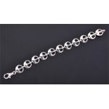 A heavy and decorative silver bracelet in the Art Nouveau taste, made in Italy, comprising of