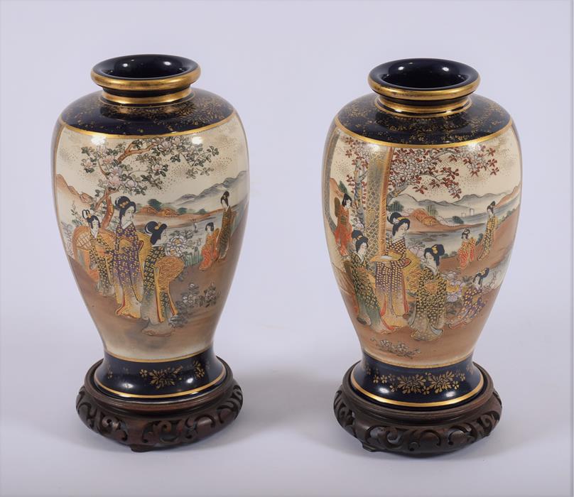 A pair of Japanese Satsuma vases c.1900  decorated with scenes of families in mountainous - Image 2 of 4