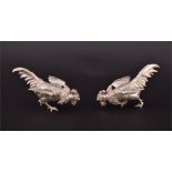 A pair of Victorian silver novelty peppers  London 1883, indecipherable makers mark, each of