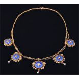 A late 19th century Belle Epoque yellow gold, diamond and enamel pendant necklace suspended with