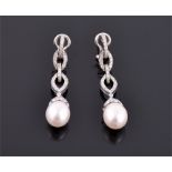 A fine pair of 18ct white gold, diamond and pearl drop earrings the articulated loops set with round