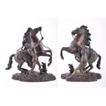 After Guillaume Coustou (1677-1746) French a pair of late 19th century bronze Marley horses