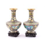 A pair of 20th century baluster Chinese Cloisonné vases  decorated with flowers and ornate patterns,