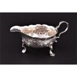 A George II silver cream boat   London 1752, indecipherable maker's mark, the boat-shaped body