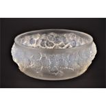 A Lalique Primeveres clear and frosted glass bowl decorated with a band of frosted glass flower