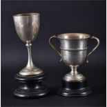 Two early 20th century silver trophy cups  one German silver, stamped 800 and dated 1905-6, the