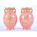 A pair of Victorian Royal Crown Derby pink ground vases  decorated with gilt flowers and twin