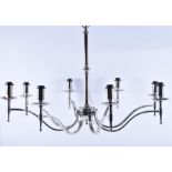 A pair of substantial contemporary eight-branch chrome plated chandeliers with swept arms and