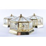 A matched set of five contemporary ceiling lights  each of octagonal form, with brass coloured