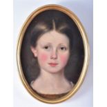 An early 20th century portrait of a girl oil on canvas, in an oval gilt frame, 35 x 24 cm. CONDITION
