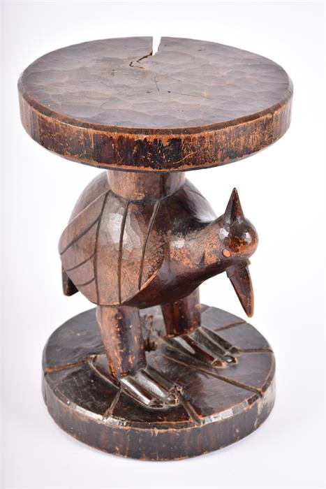 A late 19th / early 20th century carved tribal hardwood stool, possibly West African  with - Image 9 of 11