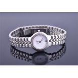 A Bulova stainless steel ladies wristwatch the white dial with date aperture and Roman numerals to