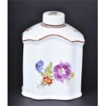 A Samson porcelain tea caddy decorated with flowers, with maker's mark, label and Christies label to