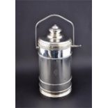 An American sterling silver Art Deco ice bucket by Cartier  of cylindrical form, with dual hinged