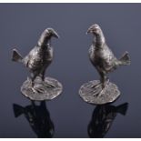 A pair of Edwardian novelty silver salt & pepper pots in the form of fighting cocks  London 1905 (