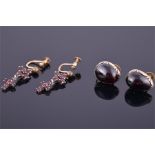 A pair of yellow metal and cabochon garnet earrings together with a pair of yellow metal and