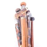 Assorted canes to include swagger sticks detailing military insignia (Royal Flying Corps, RAF