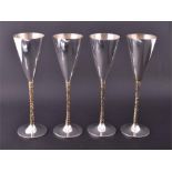 A set of four Stuart Devlin silver goblets London, dated 1977, 1978 and 1980, each with tapering