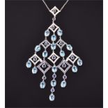 An unusual 14ct white gold, diamond, sapphire, and blue topaz drop pendant necklace set with