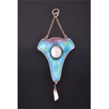 An Art Nouveau silver, enamel, and pearl pendant the mount decorated with blue, green, and purple