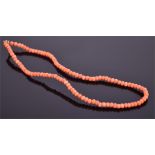 A late 19th / early 20th century coral necklace the natural orange coral beads of naturalistic