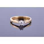 An 18ct yellow gold and solitaire diamond ring set with a round cut diamond of approximately 0.30