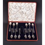A set of 12 silver teaspoons and a pair of sugar tongs Sheffield 1907, by C.W. Fletcher & Son