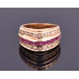 An 18ct yellow gold, diamond, and ruby ring the domed band mount calibri set with square cut