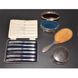 A George V three-piece dressing table set London 1931 William Comyns & Sons Ltd, comprising brush,