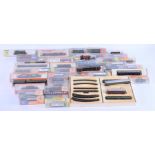 A large collection of boxed detailed composition 00 gauge model railway trains and rolling stock
