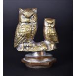 A 20th Century solid cast brass Pathfinders car mascot  In the form of an adult and an infant owl.