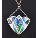 An Art Nouveau silver and enamel pendant  in the style of Charles Horner, the trefoil pendant