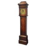 A slender Georgian oak longcase clock  accommodating a 30 hour movement, striking on single bell.