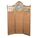 A 19th century gilt-painted wooden three-panelled room screen centred with an image of a young woman