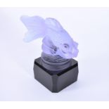 An Alexandrite frosted glass goldfish car mascot on a fitted black glass square base, 15.5 cm