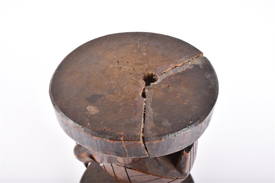 A late 19th / early 20th century carved tribal hardwood stool, possibly West African  with - Image 11 of 11