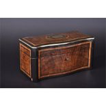 A late 19th century French walnut veneered tea caddy with serpentine front, cross banding and