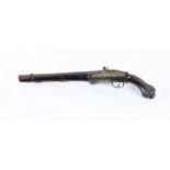An early 19th Century flintlock pistol the barrel with embossed detail, with a timber stock, incised