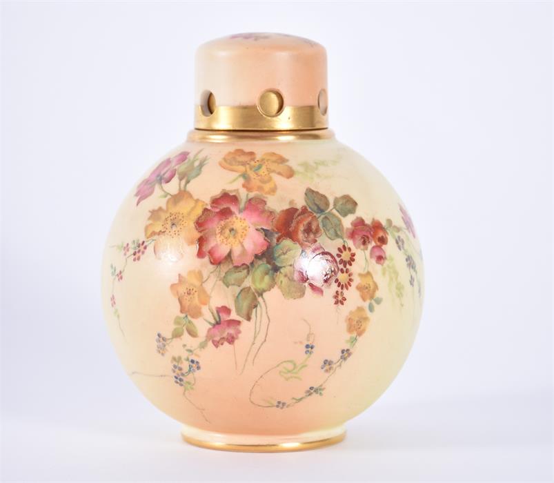 A Royal Worcester blush ivory lidded pot pourri vase of globular form, with pierced neck below a