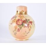 A Royal Worcester blush ivory lidded pot pourri vase of globular form, with pierced neck below a