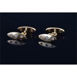 A pair of 18ct yellow gold and diamond cufflinks of tapered oval form, each cufflink set with six