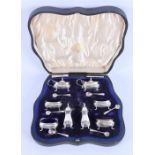 An Edwardian cased silver cruet set London 1909 by Reid & Sons and Birmingham 1909 by E S Barnsley &