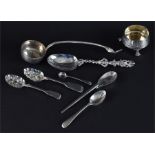 A collection of silver spoons to include a hammered example, Birmingham 1977 by Mappin & Webb, a