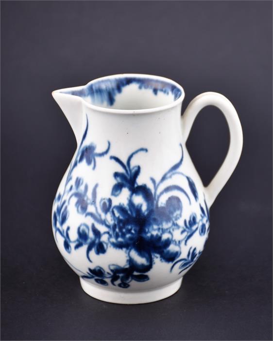 An 18th Century Worcester blue and white sparrow beak jug  painted with floral sprigs. 8.5 cm