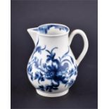 An 18th Century Worcester blue and white sparrow beak jug  painted with floral sprigs. 8.5 cm