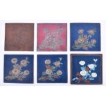 A demonstration set of six Victorian Arts and Crafts cloisonné flower pattern tiles each showing a