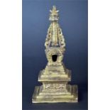 A late 19th / early 20th century century Chinese gilt bronze model tower / shrine ornament. with a
