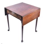 A George III mahogany drop-flap side table the top with a pair of hinged folding flaps, over a