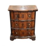 A small 18th Century Dutch bombe-fronted chest of drawers  in mixed veneers with cross-banded