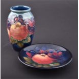 A small Moorcroft Finches baluster vase together with a Finches pin dish, both decorated with